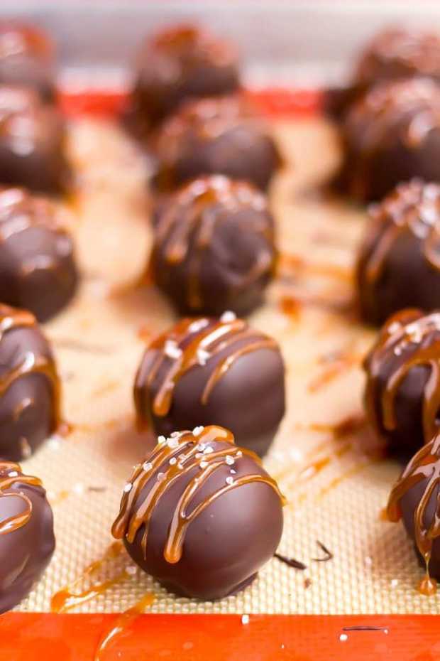 OREO Cookie Balls are fudgy, delicious, and WAY better than any store-bought candy! And the homemade Salted Caramel Sauce puts them right over the top