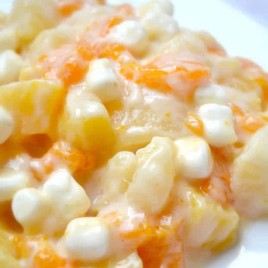 Creamy Fruit Salad w/ vanilla yogurt and mini marshmallows | thebestblogrecipes.com #dessert #fruit #salad