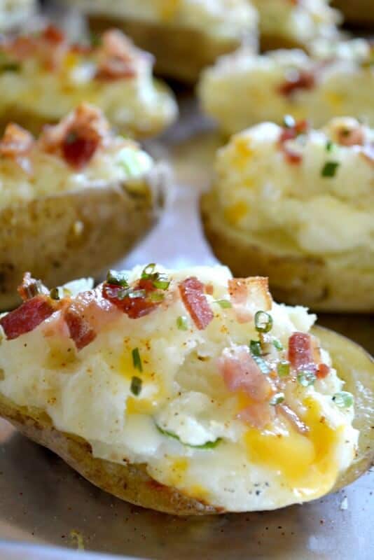 Grilled Twice Baked Potatoes are so delicious! They are the perfect side dish to any grilled meal! thebbestblogrecipes.com #BBQ #potatoes