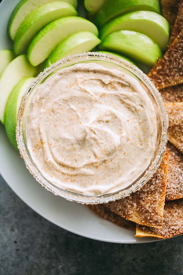 Skinny Churro Cream Cheese Fruit Dip – Lightened-up creamy fruit dip loaded with that amazing cinnamon sugar churros flavor that is sure to satisfy your cheesecake cravings!