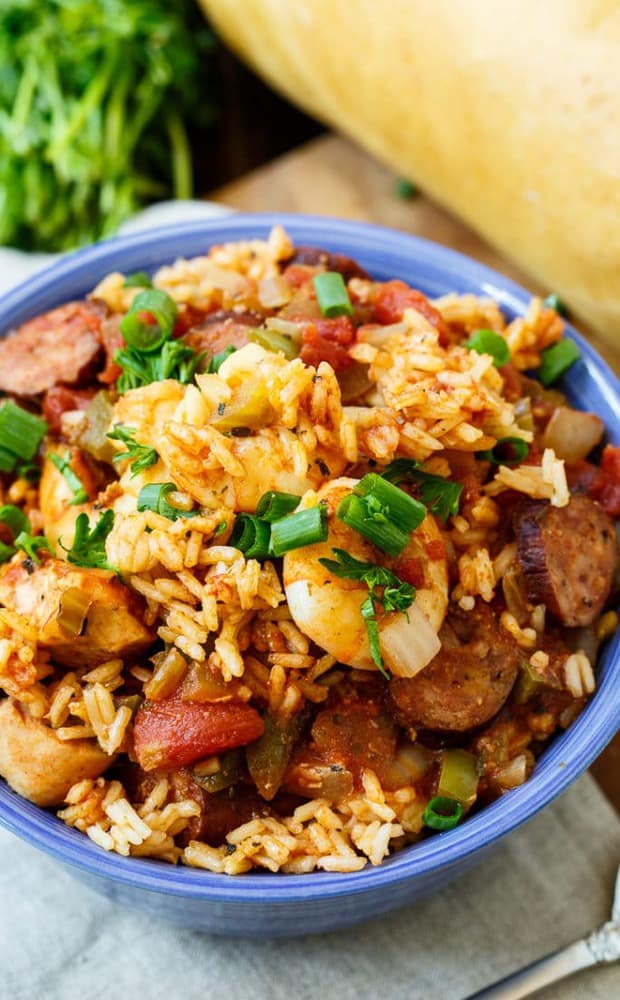 Slow Cooker Jambalaya, with chucks of chicken and andouille sausage and lots of shrimp, is a super flavorful one dish meal. Since Mardi Gras is just around the corner, my belly has been craving all those wonderful New Orleans foods.