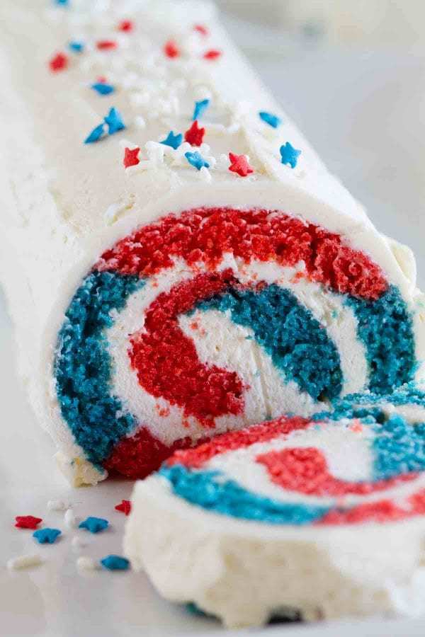 Show off your red white and blue with this festive 4th of July Cake Roll. Your guests will be amazed when you cut into it, revealing the patriotic colors.