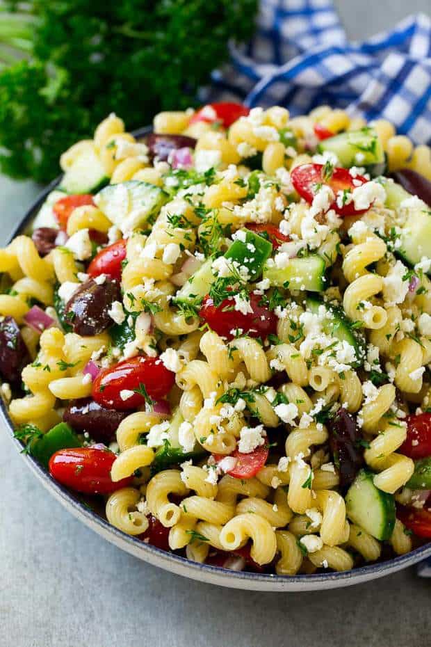 This Greek Pasta Salad is a light and fresh combination of colorful veggies, olives, and feta cheese. It's the perfect side dish for any summer gathering!