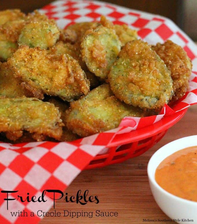 Fried dill pickles are an uber popular appetizer here in the South.  Dill pickle chips are either battered or breaded and then fried until crispy and golden. My personal preference is to make them with a crisp and crunchy breading.