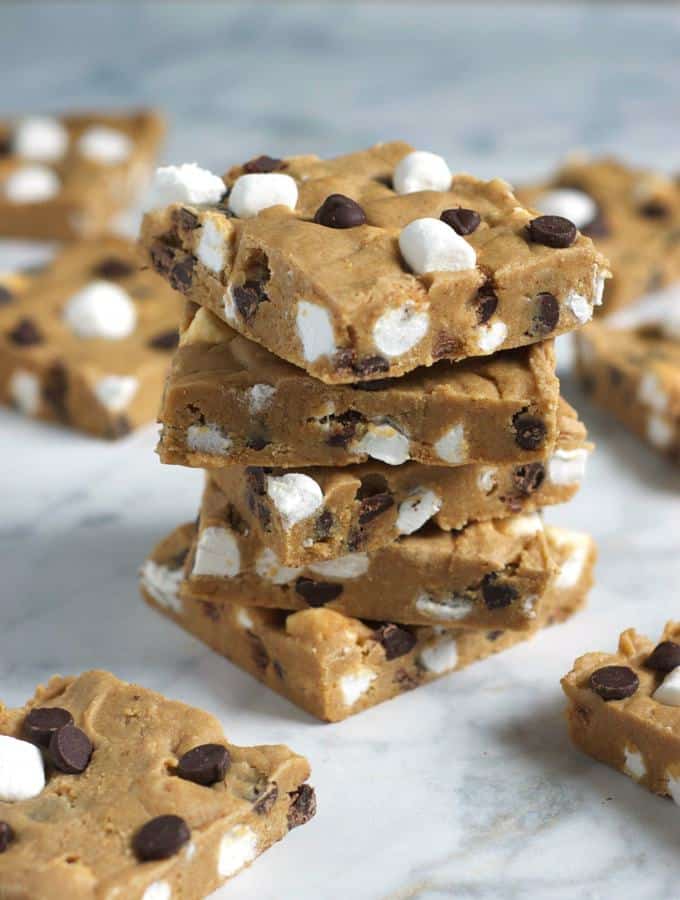 These Easy No-Bake S'mores Bars are like a cross between cookie dough, fudge and everyone's favorite cam[fire dessert!