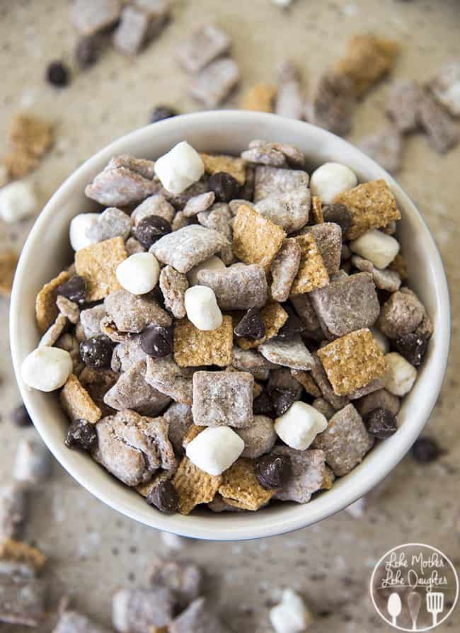 S'mores Muddy Buddies are such a great treat, with all time favorite chocolate and peanut butter muddy buddy flavors with marshmallows and golden grahams mixedin. They're perfect snack for after school, watching a movie or whatever.