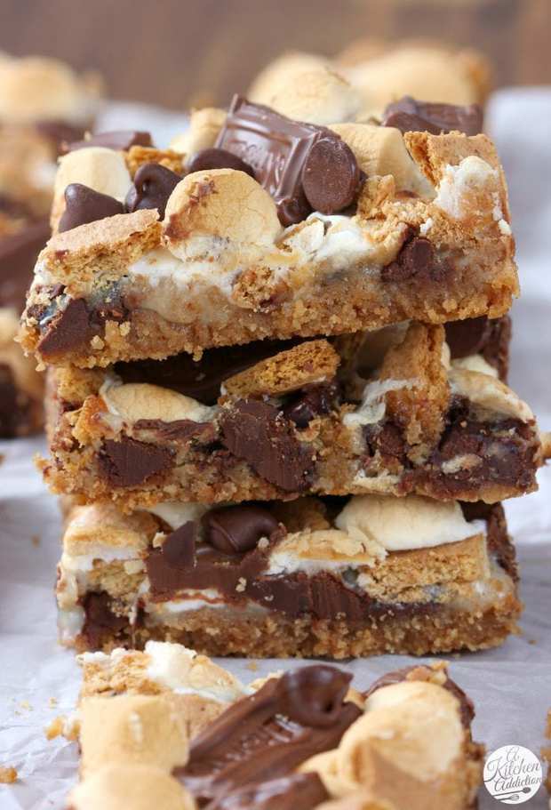 These S’mores Seven Layer Bars have all of the flavor of a gooey s’more! Toasted marshmallows, melted chocolate, crunchy graham crackers and no fire required!