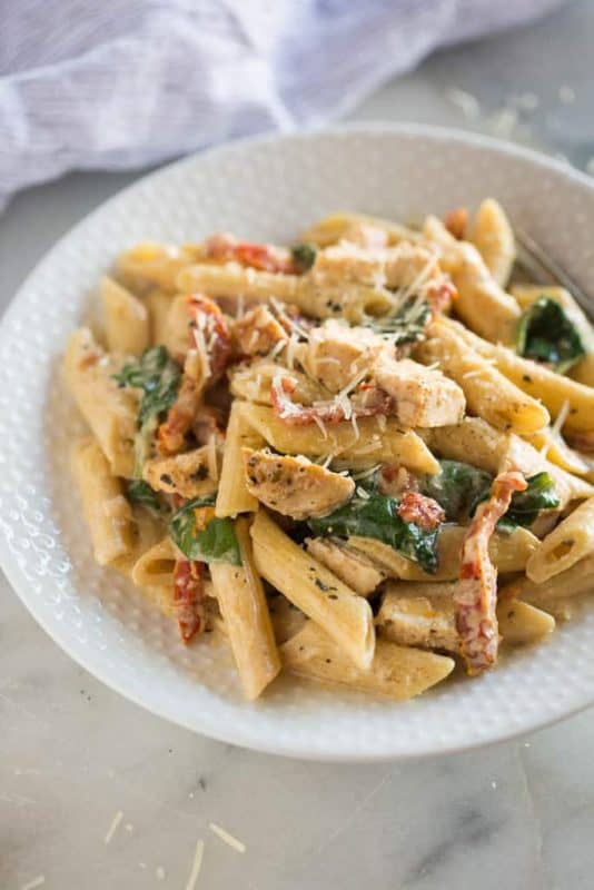 Instant Pot Creamy Tuscan Chicken Pasta - The Best Creamy Pasta Recipes - The Best Blog Recipes - Bring the liquid mixture in instant pot back to a boil using the saute button.