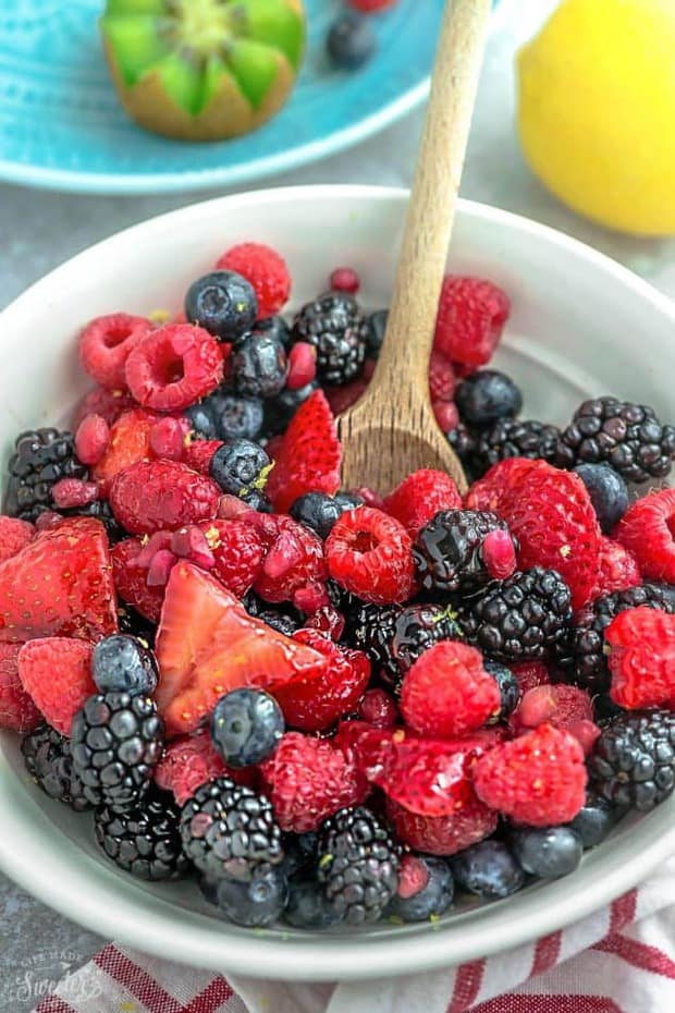 Berry Fruit Salad is the perfect easy and healthy snack. Made with triple mixed berries and a refreshing lemon and honey glaze. Best of all, so easy to customize with your favorite fresh fruit.