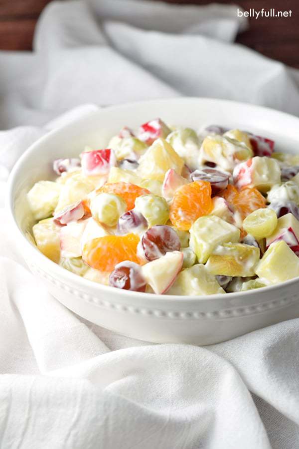 A creamy and luscious fruit salad that is perfect for summer and potlucks!