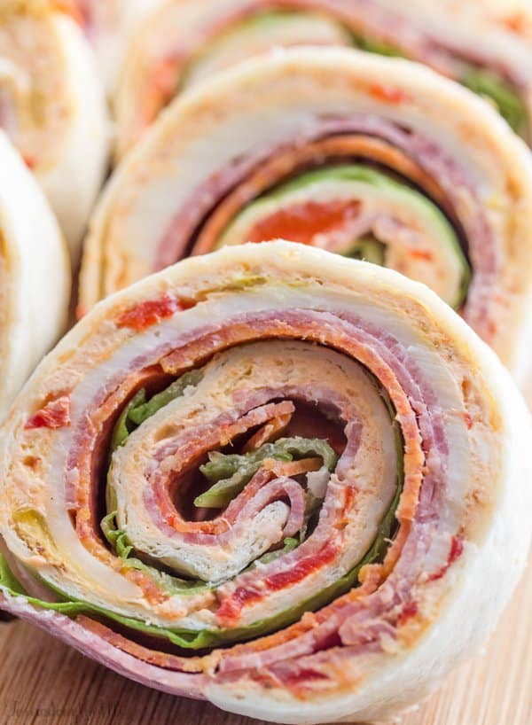 A deliciously fun appetizer for your game day, holiday or party needs, these Italian Pinwheels are tasty, fast and a fun addition to your meal