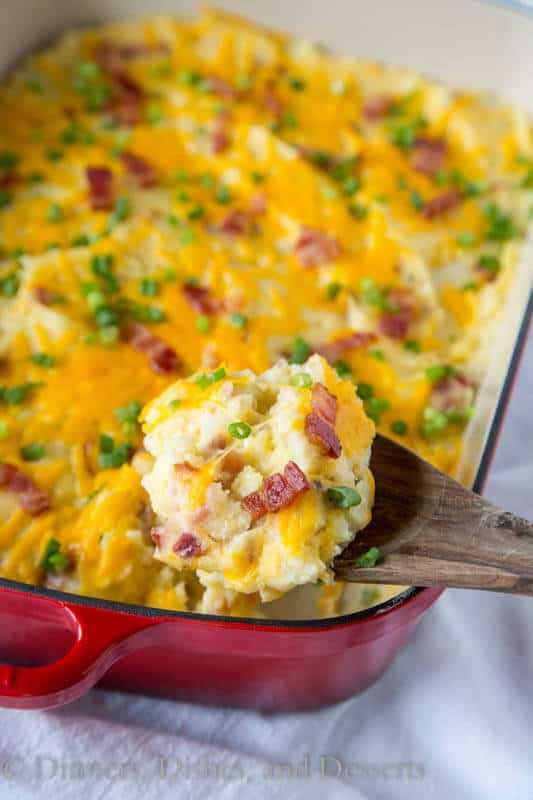 Loaded Twice Baked Potato Casserole – Turn twice baked potatoes into an easy cheesy potato casserole that will be sure to please.  Loaded with garlic, cheese, and bacon!