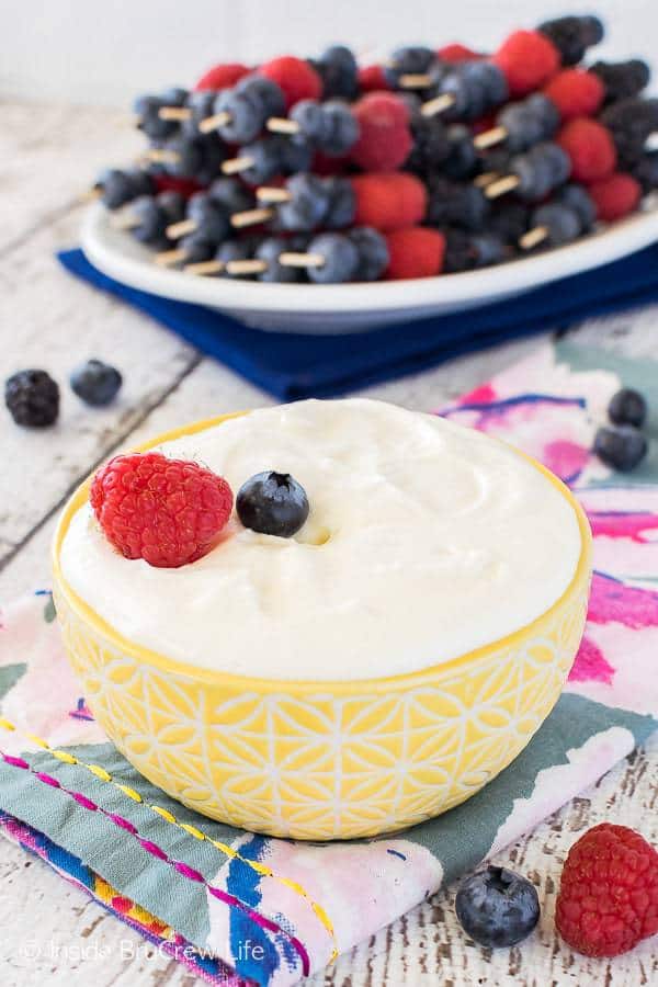 This easy two ingredient Lemon Cream Fruit Dip is a delicious and fresh dessert to serve at any meal. It’s also a great recipe for parties and picnics.
