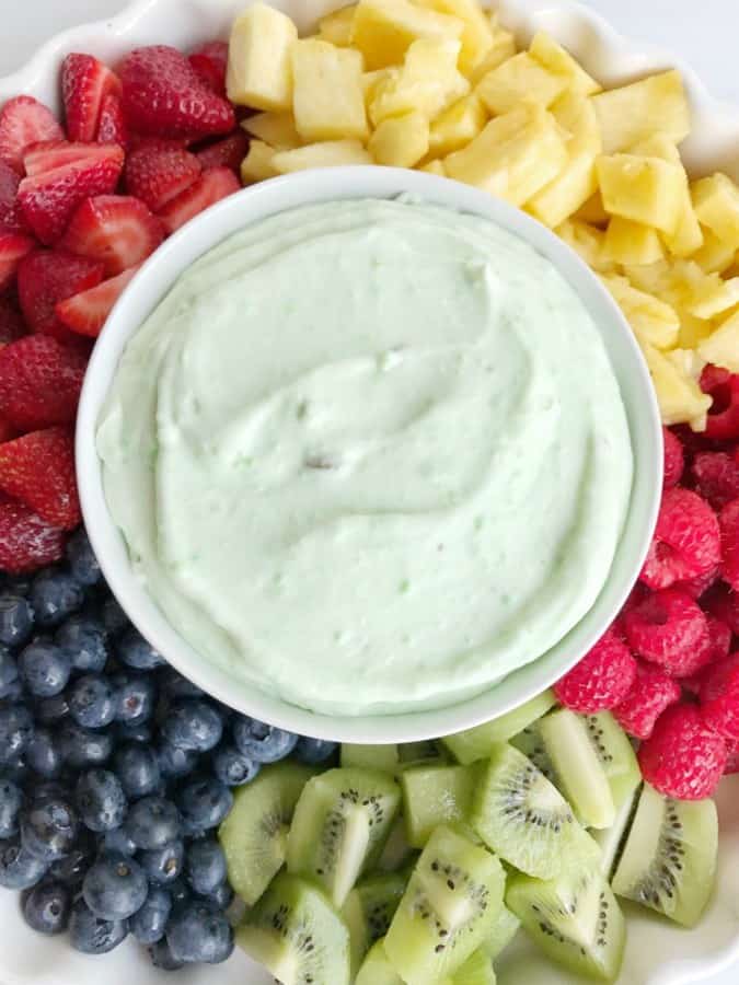 Pistachio yogurt fruit dip is the perfect summer treat for a hot day. Use up all the fresh summer fruits and make this easy 3 ingredient fruit dip. It’s light, fluffy, creamy, and has added protein from the yogurt and a light pistachio flavor.