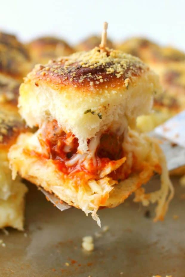 Football food doesn’t get much better than this!  Like a mini version of a meatball sub, these amazing Parmesan & Mozzarella Meatball Sliders are the perfect party food!  Super-simple to make, this easy slider recipe is great for serving at your next watch party and also makes for a great pot-luck dish.e