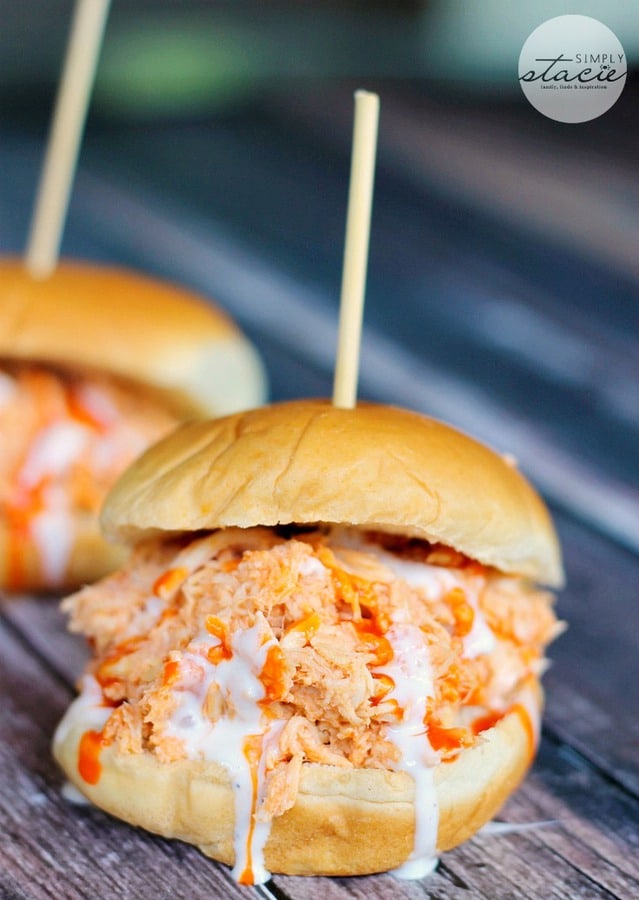 I can’t get enough Buffalo Chicken these days. I picked up a big bottle of Frank’s Wing Sauce and have been using it in lots of recipes. I made Buffalo Chicken Pizza using it as the sauce. So tasty! This recipe for Buffalo Chicken Sliders is just as good and it’s even easier to make. The slow cooker does most of the hard work!