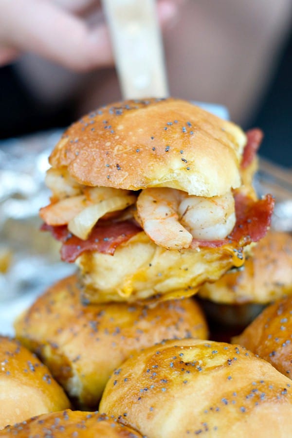 Enjoy these delicious Shrimp Bacon Sliders for easy entertaining and holiday fun! Serve them hot, or wrap in foil and bring them to the party! Watch the VIDEO below to see how easy they are to make!