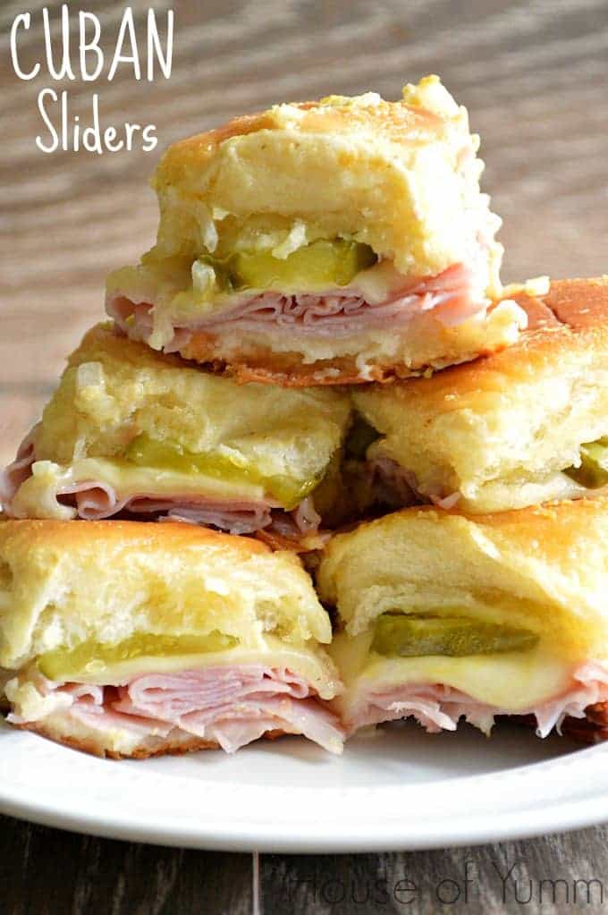 hese Cuban sliders are loaded with ham, swiss cheese, and dill pickles, topped with a dijon mustard onion spread!  Super easy to make and definitely a crowd pleaser!!
