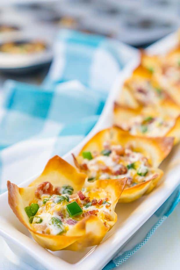 All the tasty goodness of Bacon Jalapeno Poppers inside an easy baked wonton cup! These bite size poppers make the perfect appetizer for your next party or game day celebration. You’re friends and family will love them!