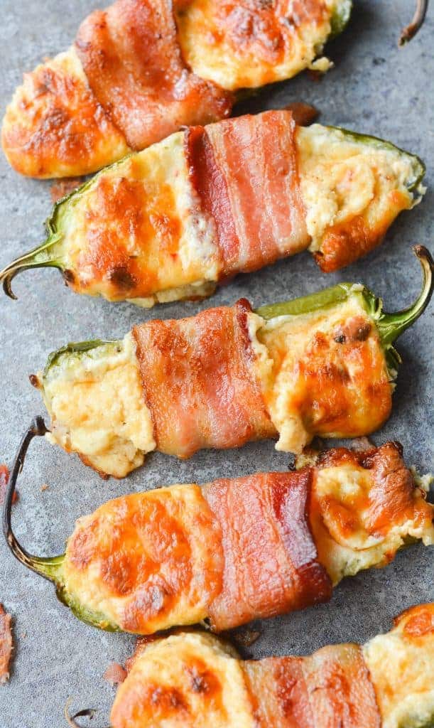 These Bacon Wrapped BBQ Jalapeno Poppers are an incredibly savory, flavorful low carb dish. Perfect to bring to any backyard BBQ, or to just enjoy at home!