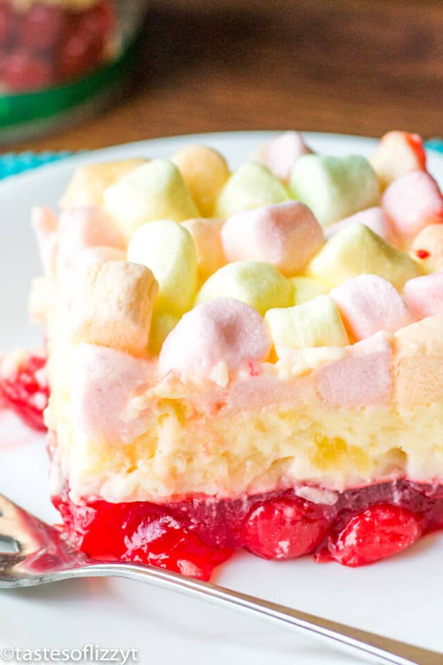 his Cherry Pineapple Marshmallow Jello Salad is a long-time family favorite recipe. There’s a cherry layer paired with a tangy lemon cream cheese layer.