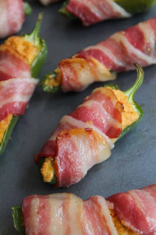 Paleo Jalapeño Poppers – jalapeño stuffed with a dairy free cashew cream, wrapped in a slice of bacon and baked to crispy perfection. It’s an umami party for your mouth!