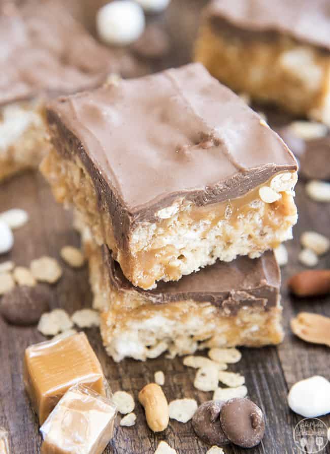 Snickers Rice Krispie Treats are traditional marshmallow rice krispie treats made even better topped with salty peanuts, gooey caramel and a rich layer of chocolate. They're perfectly sweet, salty and delicious!