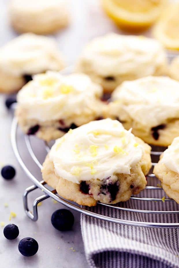 Soft, cake like cookies that are bursting with fresh blueberries and have a hint of lemon.  These cookies melt in your mouth and are topped with the most amazing lemon cream cheese frosting!