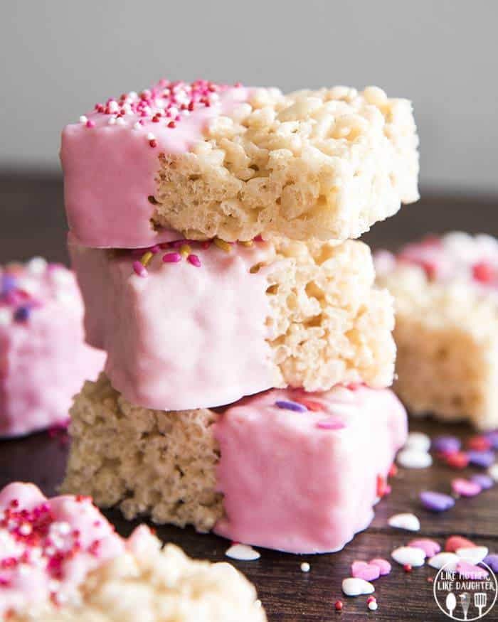 Pink Rice Krispie Treats are fun dessert, with a gooey rice krispietreat dipped in pink chocolate and decorated with sprinkles!