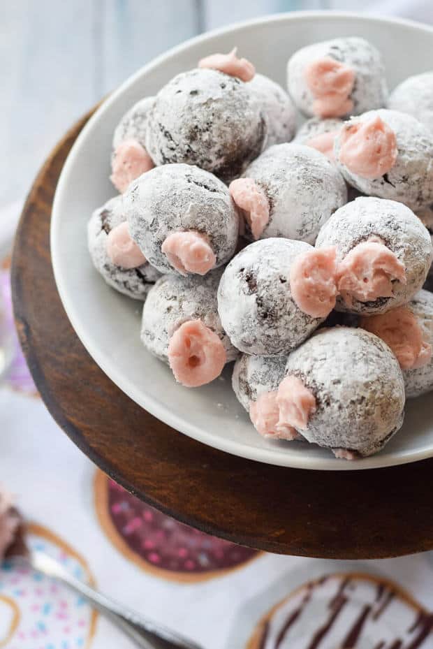 Need a sweet treat for your honey this Valentine’s Day?  You’ll win big if you make these Chocolate Donut Holes with Pomegranate Cream Filling. They are sweet, fluffy and filled with creamy goodness. {gluten free}