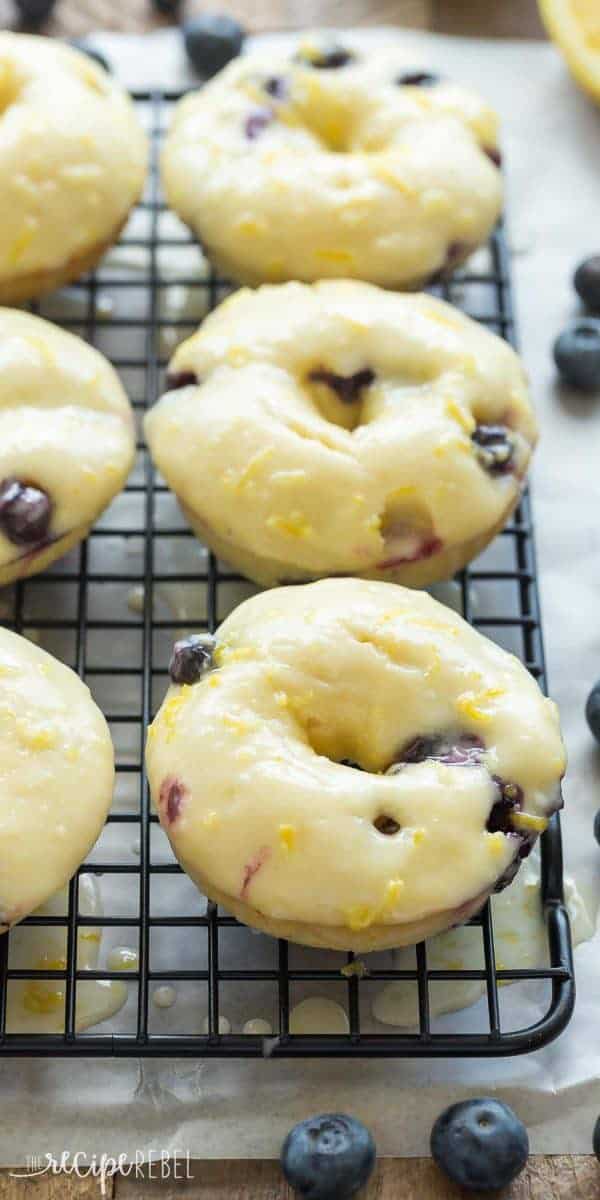 Baked Lemon Blueberry Doughnuts are fluffy, packed with citrus flavor and bursting with blueberries and covered in a tangy glaze! Baked donuts are the perfect healthy breakfast or snack.