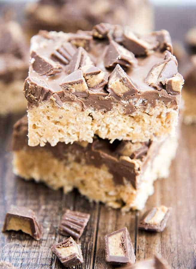 PPeanut Butter Cup Rice Krispie Treats are a perfect easy and delicious treat, with a peanut butter marshmallow krispie treat base, topped with a chocolate peanut butter ganache and chopped peanut butter cups!