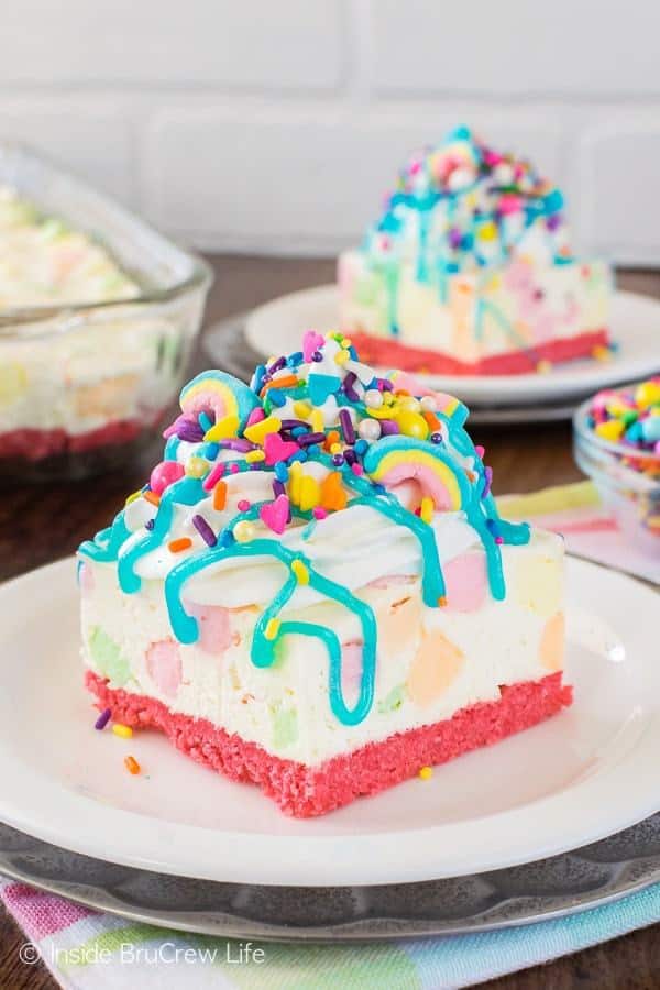 These creamy No Bake Rainbow Unicorn Cheesecake Bars are loaded with colored marshmallows and topped with sprinkles. It’s the perfect spring dessert for any party or celebration!
