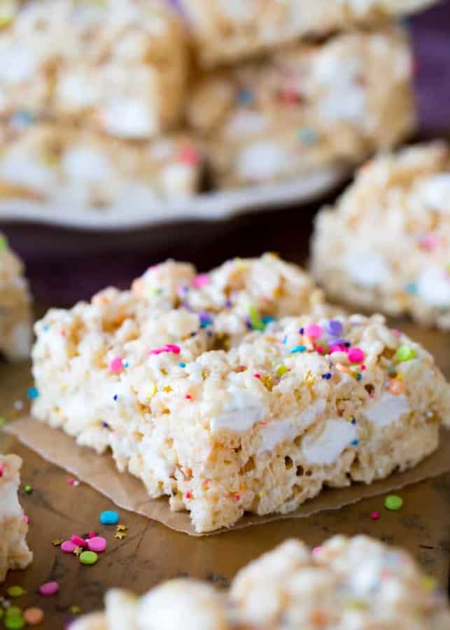 Extra marshmallows, premium butter, a splash of vanilla extract, and plenty of sprinkles.  That’s how I like my Rice Krispie Treats, and I think you’re going to love this gourmet twist on this classic treat, too!
