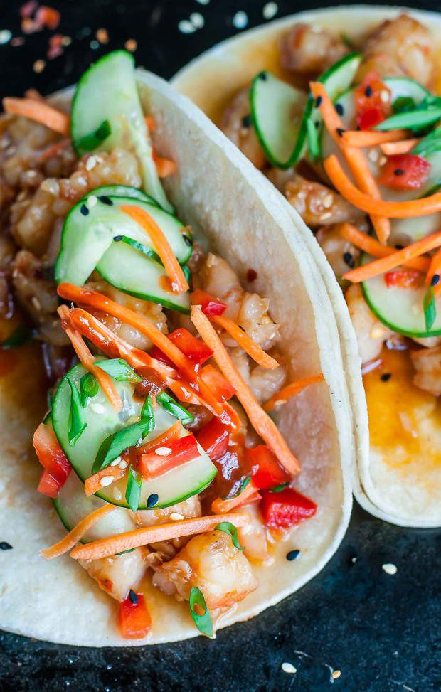 Szechuan Shrimp Tacos with Cool Cucumber Slaw are ready to shake up your taco game! A fun fusion of two of my all-time favorites, these tasty tacos are ready to rock your plate in under 20 minutes.