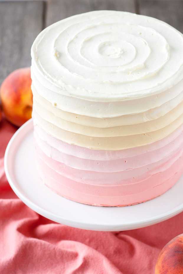 Pretty in peach! this peach layer cake is the perfect way to wrap up the summer months. Vanilla cake with a peach filling and peach flavoured frosting.