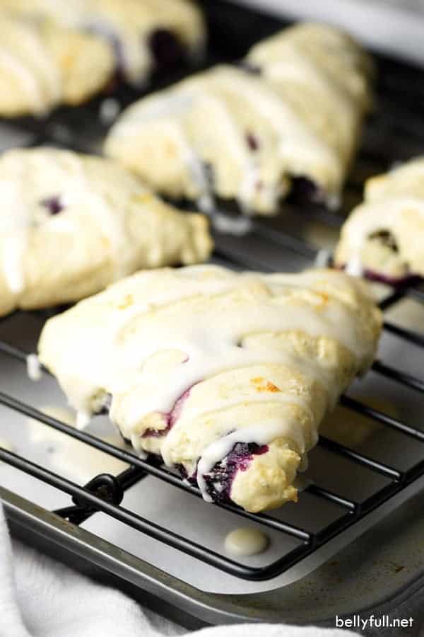 Blueberry Lemon Scones – tender flaky scones with fresh blueberries throughout and a dreamy lemony glaze!