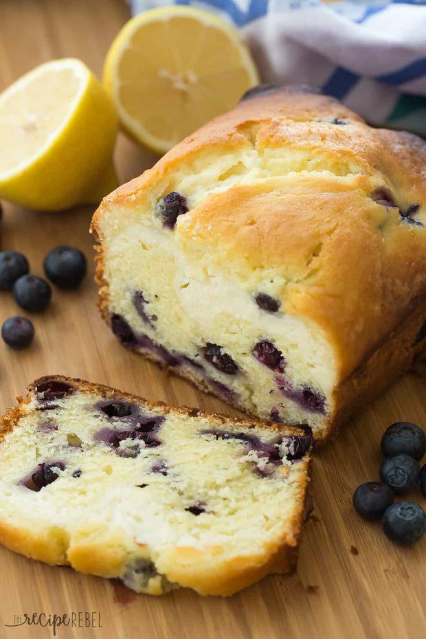 This Cream Cheese Filled Blueberry Lemon Bread is sweet, tangy and filled with a decadent cheesecake layer! Let’s call it breakfast or dessert.