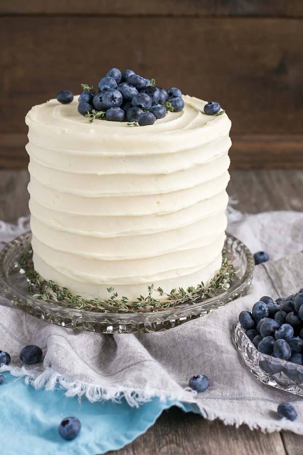 The delicious combination of bananas and blueberries gets paired with a tangy cream cheese frosting in this Blueberry Banana Cake.