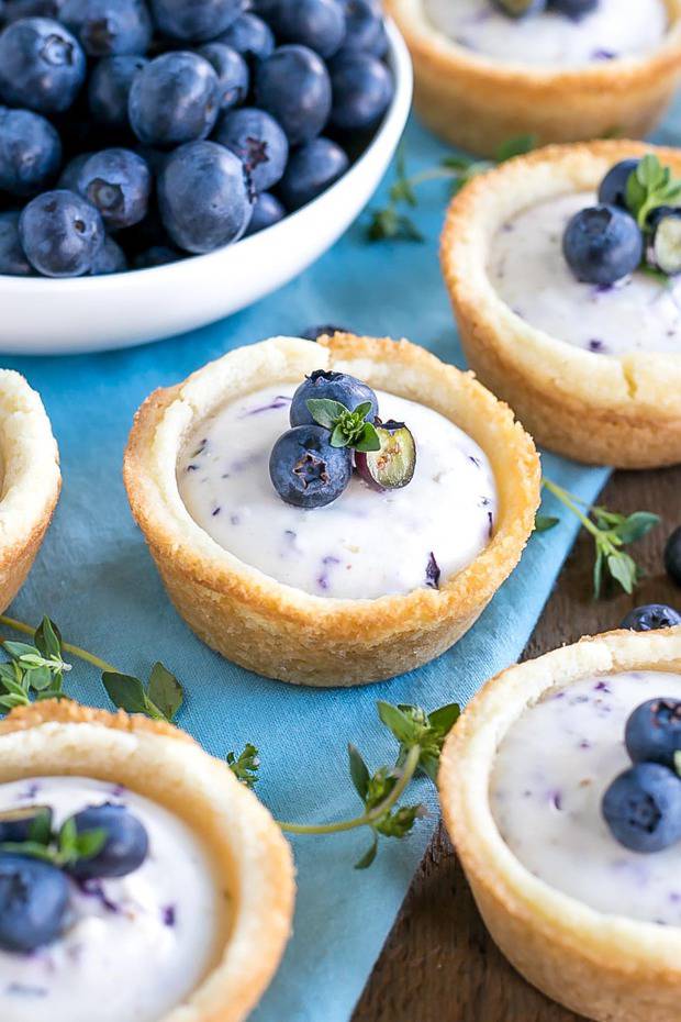 These Blueberry Cheesecake Cookie Cups make perfect use of those fresh summer berries!