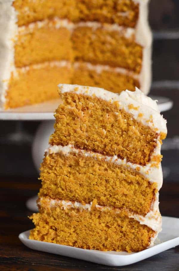 Pumpkin Dream Cake: three big layers of super moist pumpkin spiced cake, made completely from scratch, frosted with a sweet cinnamon maple cream cheese icing!