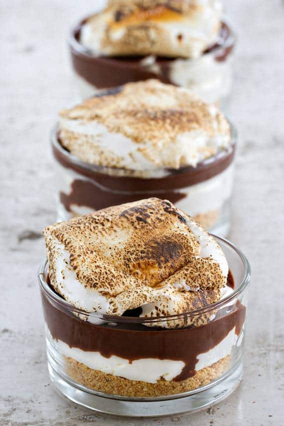 Cheesecake, chocolate ganache and graham cracker crumbs are the start of a pretty terrific dessert. Top this no-bake dessert with a gooey roasted marshmallow to create summer dessert perfection.
