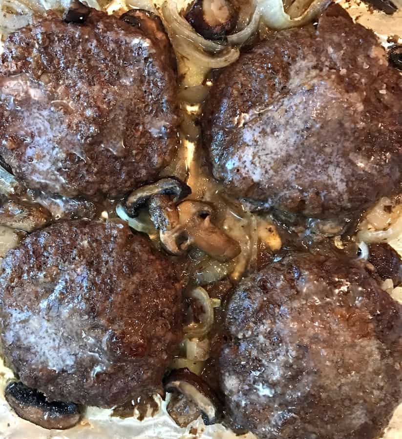 Juicy, hamburger steaks with roasted mushrooms and onions made on one pan. Delicious dinner with easy clean-up!