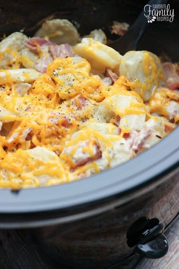 Slow Cooker Au Gratin Potatoes and Ham is comfort food at its best!  It is a great recipe to use up leftover ham after a holiday dinner.  