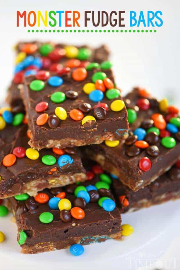 No one can resist these EASY Monster Fudge Bars! Oatmeal chocolate chip cookie bars topped with easy fudge and mini M&M’s! This is one decadent treat!