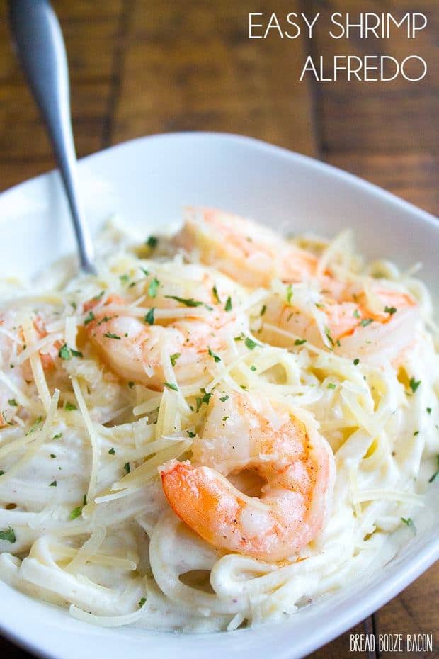 Get dinner on the table in about 15 minutes with this Easy Shrimp Alfredo recipe that’ll rival any restaurant! Perfect for busy nights and sure to get rave reviews from the whole family!