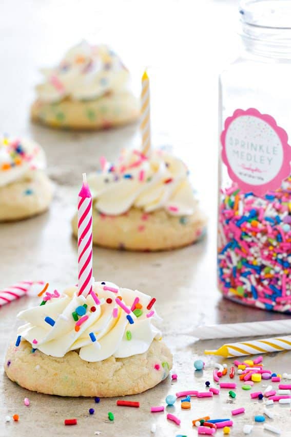 Birthday Cake Cookies are everything you love about birthday cake in cookie form – sprinkles, buttercream frosting, and more sprinkles.