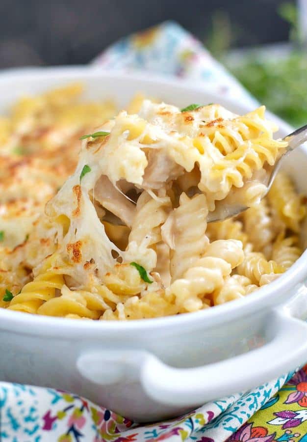 A 10-minute total crowd-pleaser, this Dump and Bake Chicken Alfredo Pasta Casserole is an easy, cheesy, comfort food dinner for your busiest weeknights — and you don’t even have to boil the pasta!