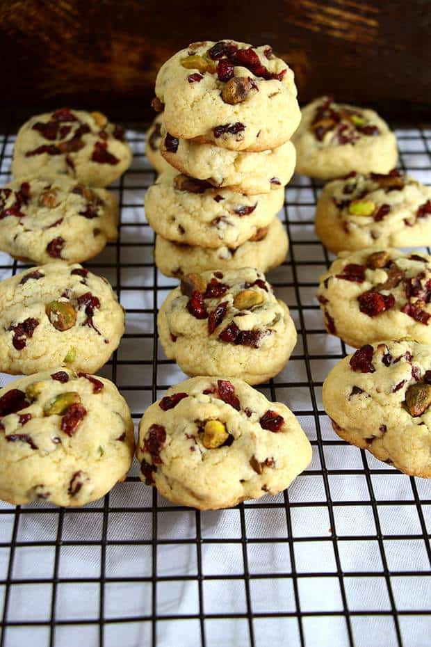 Cranberry Pistachio Cookies are a deliciously festive cookie to whip up for the Holidays!  Soft, buttery dough filled with tart cranberries and crunchy pistachios.