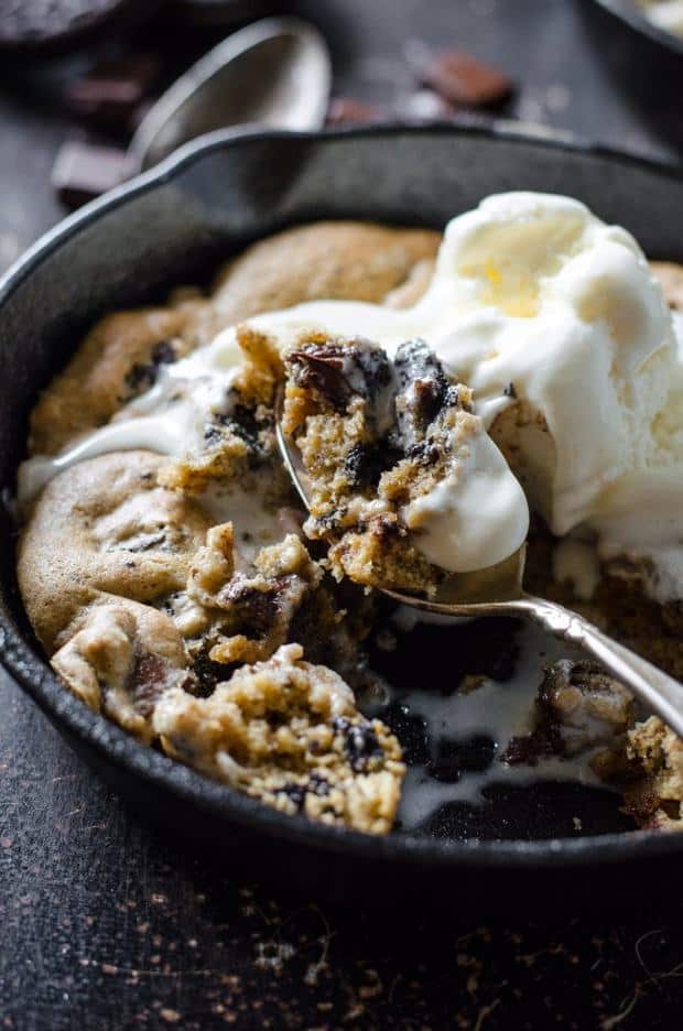 This cookie is insane. Soft and gooey, topped with a big spoonful of vanilla ice cream.